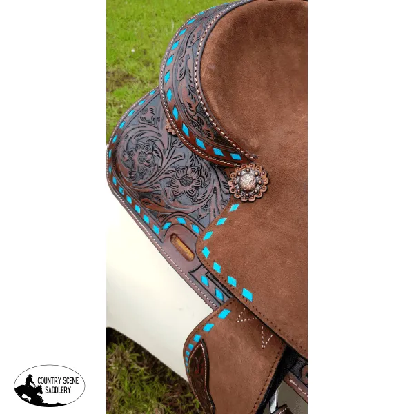 10" Double T  Pony hard seat barrel style saddle with turquoise buckstitch trim.